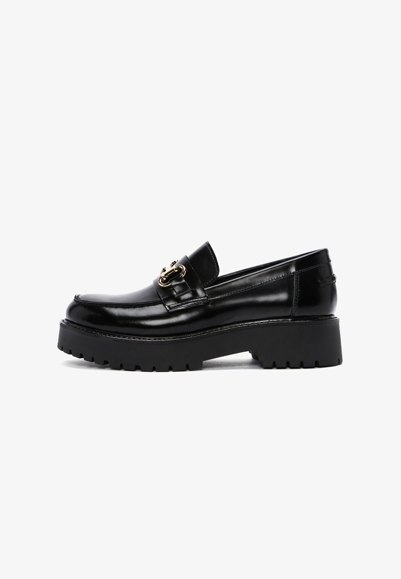 Black leather loafer with a chunky rubber sole, featuring a decorative gold hardware detail on the vamp and a smooth, glossy finish.