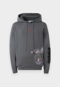 Sudadera gris con cordón, que presenta el texto rojo "ICEBERG" y gráficos de dibujos animados bordados en varios colores, incluyendo personajes y "CHARLIE" en la manga.