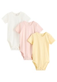 Trois bodysuits à manches courtes en coton blanc, rose et jaune, dotés de fermetures à pression en bas et d'une texture lisse.
