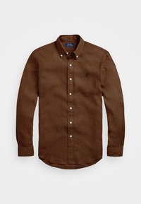 Camicia marrone a maniche lunghe realizzata in tessuto intrecciato con colletto a punta. Presenta bottoni bianchi e un piccolo logo sul lato sinistro del petto.