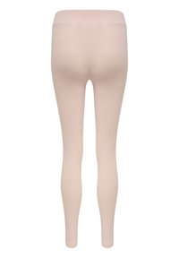 Jasnoróżowe legginsy o gładkiej fakturze, elastycznym materiale i wysokim pasie, z dopasowanym fasonem i bez widocznych szwów.