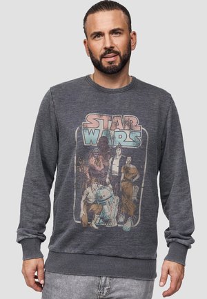 Dunkelgrauer Sweatshirt mit einem Vintage-Star-Wars-Graphic-Print, geripptem Kragen und Bündchen, entspannter Passform und weicher Textur.