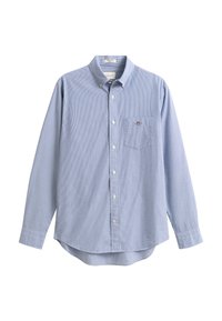 Vaaleansininen puuvillapaita valkoisin raidoituksin. Etuosassa rintatasku ja pyöristetty helma. Pitkät hihat, joissa napilliset kalvosimet.