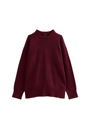 Pullover lavorato a maglia color bordeaux con collo rotondo, maniche lunghe e polsini a coste. Il tessuto ha una consistenza morbida, con una vestibilità ampia e orlo dritto.