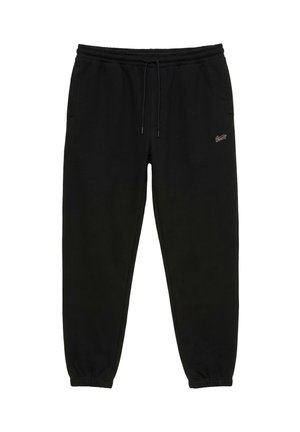 Pantalon de survêtement noir avec taille et poignets élastiques, cordon de serrage, poches latérales et petit logo sur la cuisse droite.