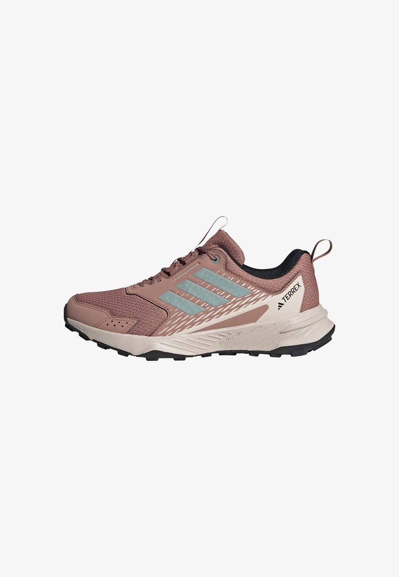 Rose-colored athletic shoe with mesh upper, light blue accent stripes, black collar, and rugged rubber sole. Reflective details present.