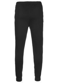 Svarta tapered sweatpants med elastisk midja och avsmalnande anklar, visade mot en vit bakgrund.