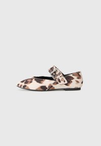 Flat women's shoe with brown and beige animal print, pointed toe, and large silver buckle strap on a light gray background.