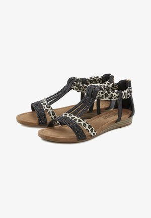 Schwarze Sandale mit Leopardenmuster aus texturiertem Stoff, mit Perlenakzenten, offener Zehenpartie und einer gepolsterten Sohle für Komfort.