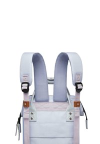 Backpack with padded, light blue straps, made of durable fabric. Features adjustable straps, metal clips, and leather accents.