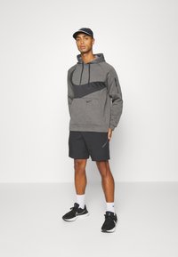 Nike Performance Majica s kapuljačom - charcoal heather/dark smoke grey/black