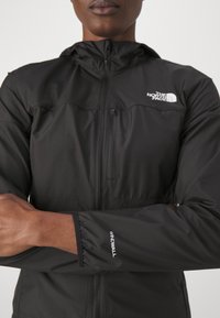 The North Face HIGHER RUN WIND JACKET - Veste de running - black