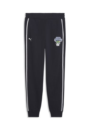 Pantaloni da jogging neri con strisce laterali bianche, vita elasticizzata, logo Puma sulla coscia sinistra e toppa del club di calcio "Super Puma" sulla coscia destra.