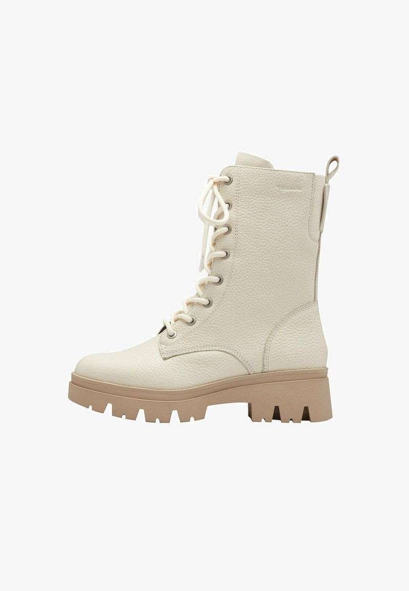White leather ankle boot with textured upper, lace-up front, pull tab, and chunky beige sole featuring deep grooves for traction.