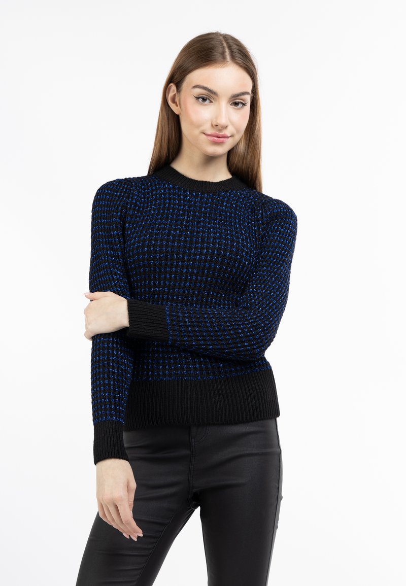 Maglione lavorato a maglia con base nera e dettagli a motivo blu e bianco, polsini e orlo a coste. Maniche lunghe con scollatura rotonda.