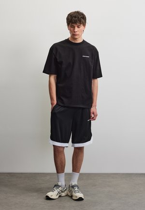 Pegador, LOGO BASKETBALL - Trainingsbroek - black