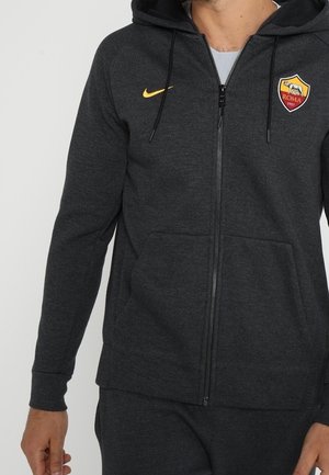 Dunkelgrauer Kapuzenpullover mit Reißverschluss, gelbem Nike-Logo auf der linken Brust und AS Roma Fußballvereinswappen auf der rechten Brust.