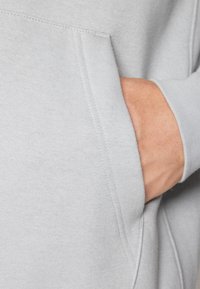 Nike Sportswear Mikina s kapucí - grey