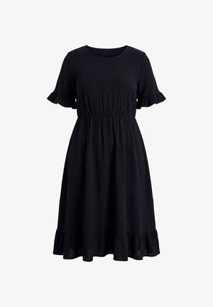Black short-sleeve dress with round neckline, gathered waist, and ruffled hems on sleeves and skirt, textured fabric.