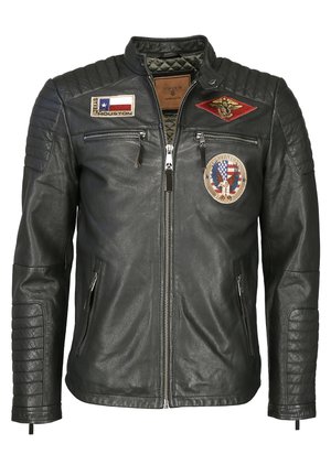 Black leather motorcycle jacket with quilted shoulder detail, multiple patches, front zip closure, and side pockets.