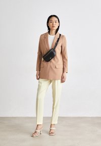 COACH POLISHED PEBBLE BETHANY BELT - Bum bag - black