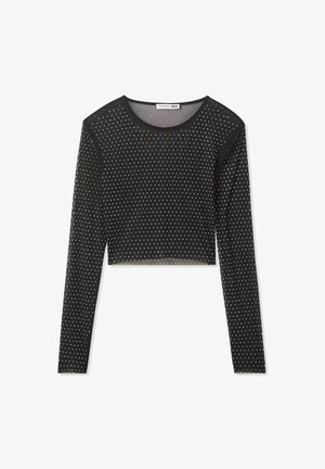 Czarny krótki top z długim rękawem, wykonany z lekkiego materiału, z całkowitym wzorem małych, błyszczących srebrnych kropek i okrągłym dekoltem.