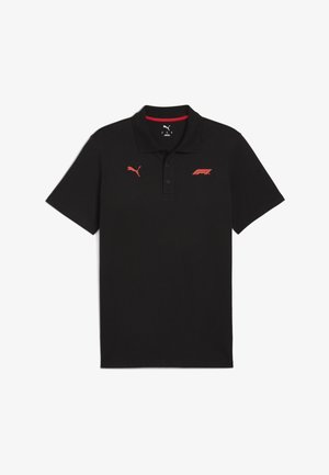Sort polo skjorte lavet af bomuld med krave. Har et rødt Puma-logo og røde F1-grafikker på venstre bryst. Kortærmet, klassisk pasform.