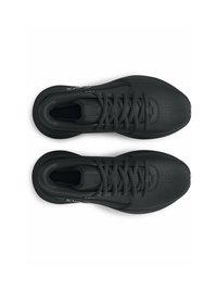 Baskets de sport noires avec une tige en cuir lisse, dotées d'un design à lacets, de panneaux texturés et d'un accent de logo discret.