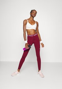 Nike Performance 365 - Leggings - dark beetroot/white