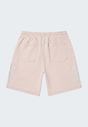 Shorts en coton rose clair avec taille élastique, deux poches arrière et broderie florale blanche sur les côtés extérieurs de chaque jambe.