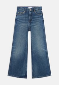 Široke traperice od med plavog denima s izblijedjelim završetkom. Imaju klasičan dizajn s pet džepova i metalno kopčanje.