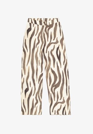 Pantalon à jambes larges en tissu crème avec un motif audacieux de rayures zèbre marron et noir. Texture lisse avec une taille élastique.