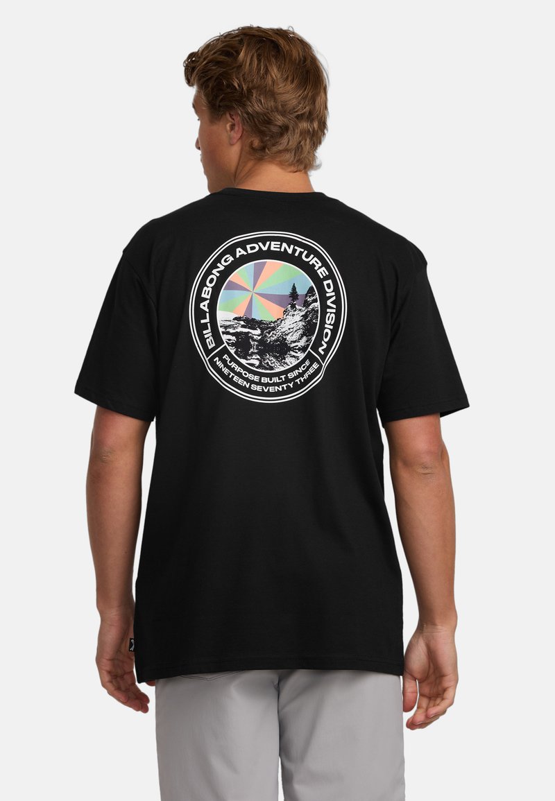Black t-shirt featuring a circular graphic on the back with a mountain scene and colorful geometric design. Short sleeves and relaxed fit.