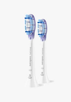 Philips Sonicare G3 elektrische Zahnbürstenköpfe mit weißer Basis, lila Akzenten, weichen blauen Borsten und mehreren Reinigungsmodi.
