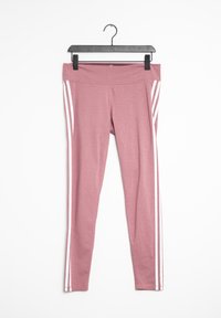 Högmidjade, rosa leggings med en slät yta, som har tre vita ränder på varje sida och en hängande krok för upphängning.