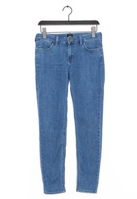 Modré džíny z denimu s úzkým střihem, vybavené zapínáním na knoflíky, poutky na pásek a předními/zadními kapsami. Tkanina má hladkou texturu.