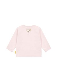 Light pink long-sleeve shirt made of soft cotton, featuring a small embroidered bear design on the back and a rounded neckline.