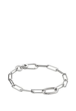 Silver chain bracelet with elongated oval and rectangular links, featuring a circular clasp engraved with brand text.