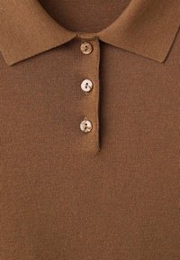 Brown knitted polo shirt with three pearl buttons, a tailored collar, and a smooth texture, suitable for casual wear.