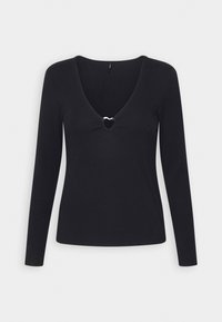 Musta pitkähihainen pusero, jossa on syvä V-pääntie ja pyöreä leikkaus yksityiskohtana keskellä, valmistettu sileästä ja venyvästä kankaasta.