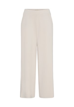 Pantalon beige à jambes larges avec poches latérales et taille élastique, présenté sur un fond blanc uni.