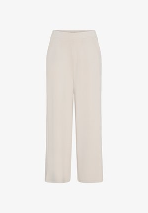 Pantalon beige à jambes larges avec poches latérales et taille élastique, présenté sur un fond blanc uni.