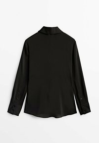 Blouse noire à manches longues avec poignets boutonnés et petit col, vue de dos sur fond blanc.