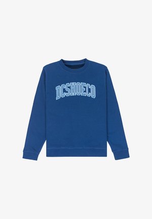 Niebieska bluza z bawełny, z okrągłym dekoltem i ściągaczami na rękawach. Logo "DCSHOECO" w białym kolorze na wysokości klatki piersiowej. Gładka struktura.