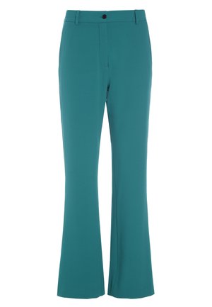 Tilaustyönä tehdyt sinivihreät housut, joissa on lievä levenemä, edessä nappi, vyölenkit ja piilotettu vetoketjusuljin.