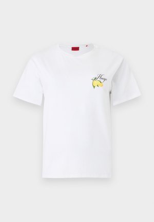 Balti marškinėliai trumpomis rankovėmis su maža geltona citrinos grafika ir užrašu „Hugo“ kairėje krūtinės pusėje.