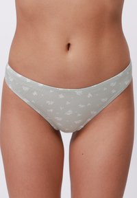 Világos zöld pamut bikini alsó, amely finom virágmintával rendelkezik, alacsony derekú szabású és puha, rugalmas derékpánttal.