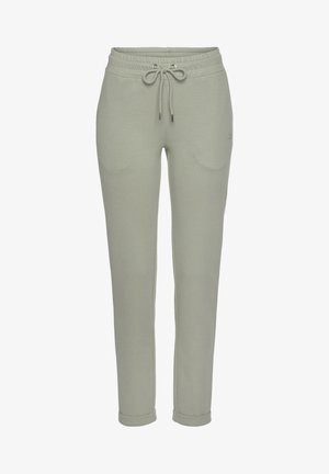 Lichtgroene, taps toelopende sweatpants met een elastische tailleband en drawstring. Voorzien van zijzakken en manchetten aan de onderkant. Soepele textuur.