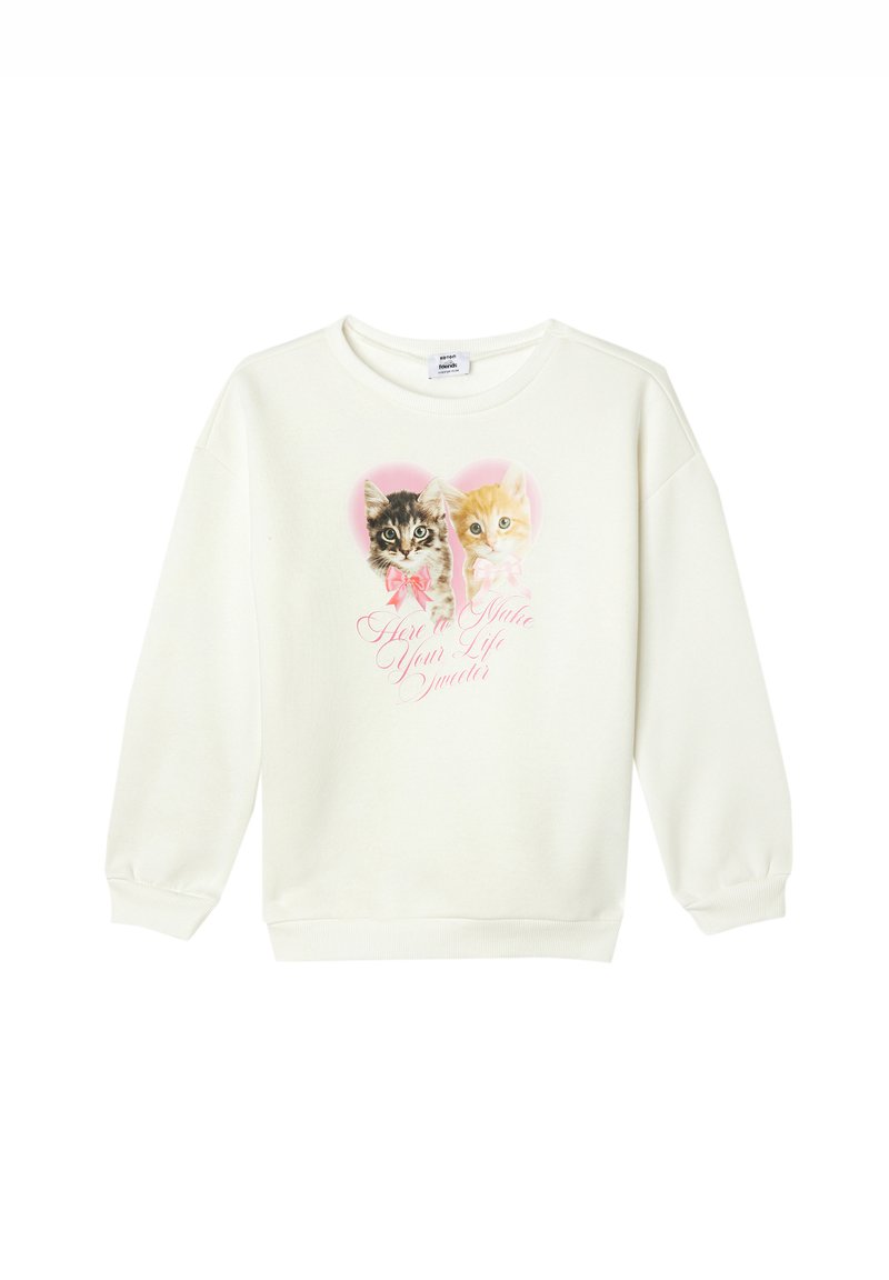 Witte trui met prints van twee katten in roze harten. Heeft lange mouwen en geribbelde boorden, met de tekst "Hier om je leven zoeter te maken."