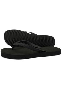 Black rubber flip-flops with textured soles, thin straps, and a flat design. Bottom shows ribbed pattern for traction. Prominent brand name visible.